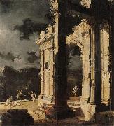 An architectural capriccio with figures amongst ruins,under a stormy night sky